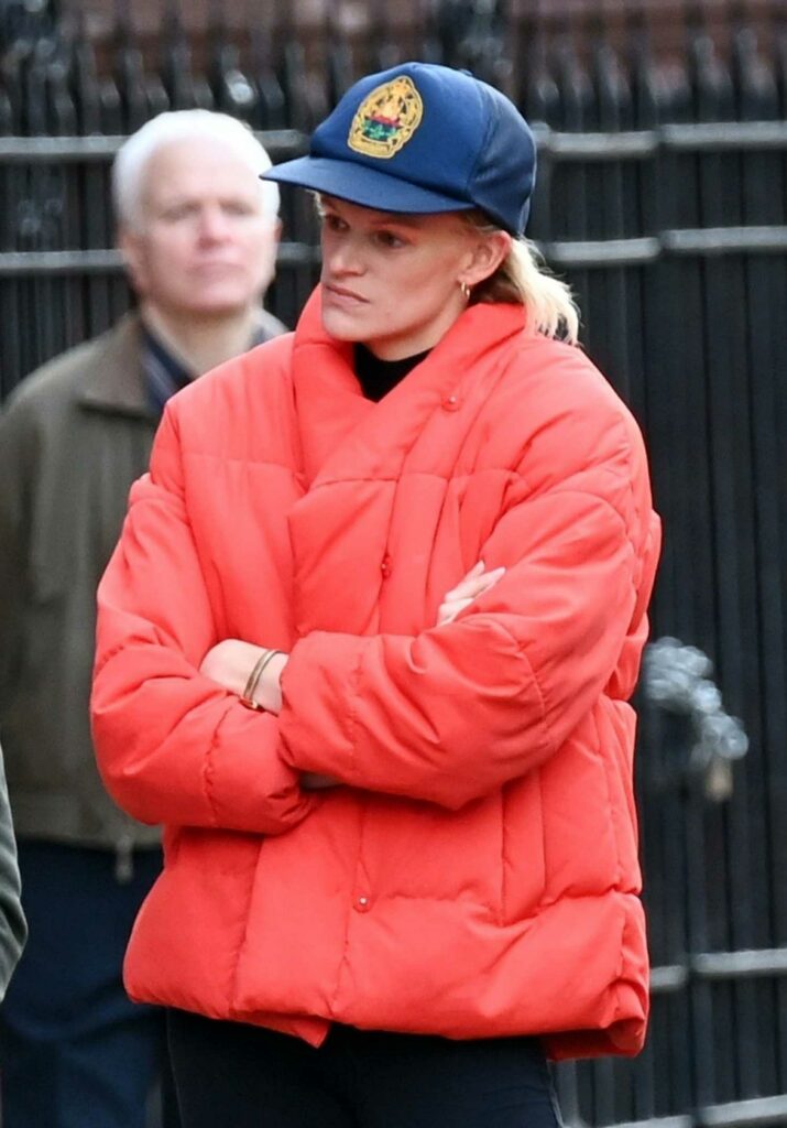 Elizabeth Debicki in a Red Puffer Jacket