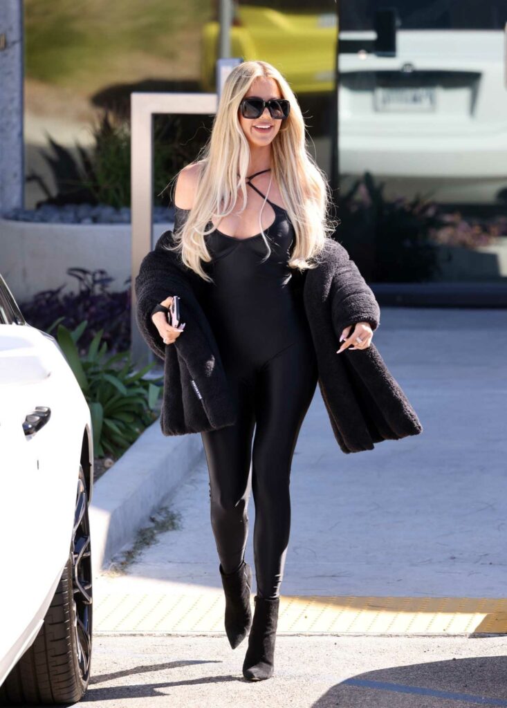 Khloe Kardashian in a Black Catsuit