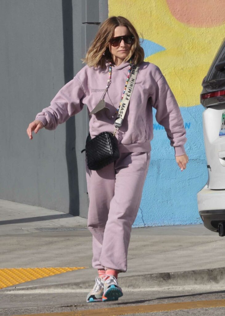 Kristen Bell in a Purple Sweatsuit