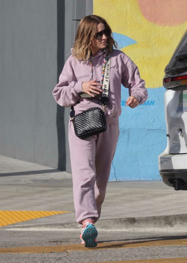 Kristen Bell in a Purple Sweatsuit