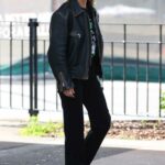 Lara Bingle in a Black Leather Jacket Arrives at Airport in Sydney