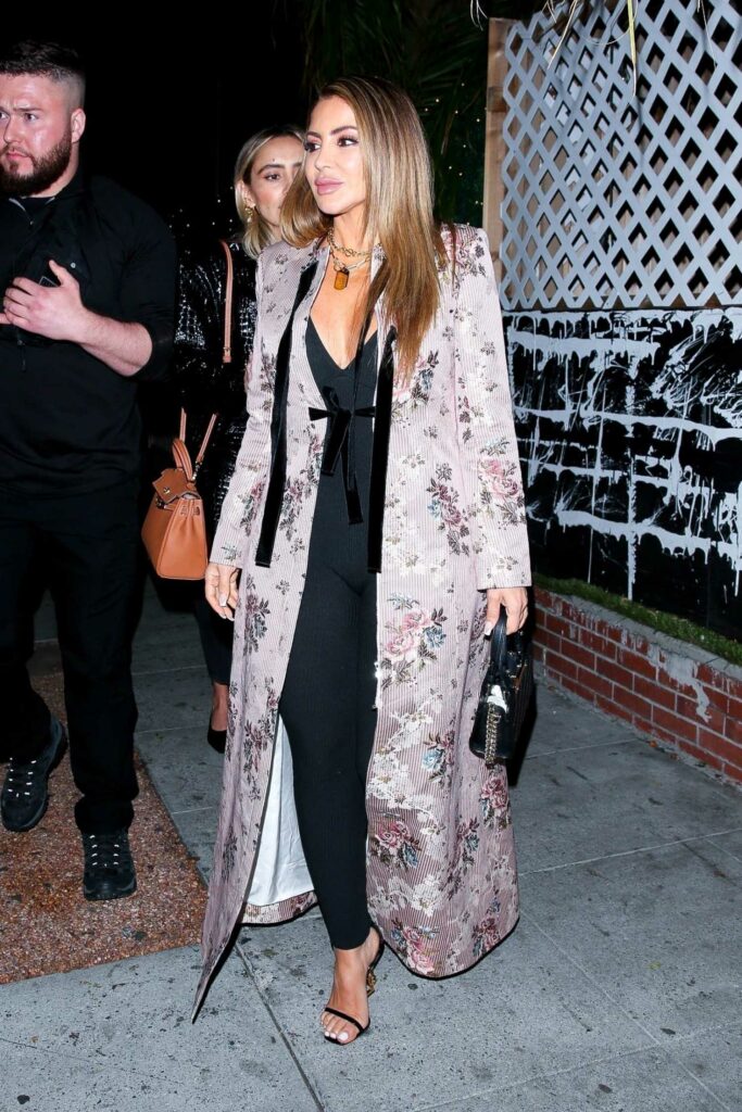 Larsa Pippen in a Floral Trench Coat