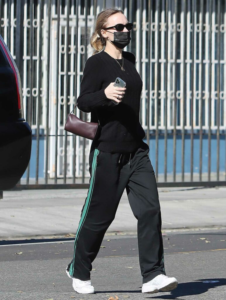 Lily-Rose Depp in Black Protective Mask