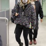 Rita Ora in a Black Cap Arrives in Milan