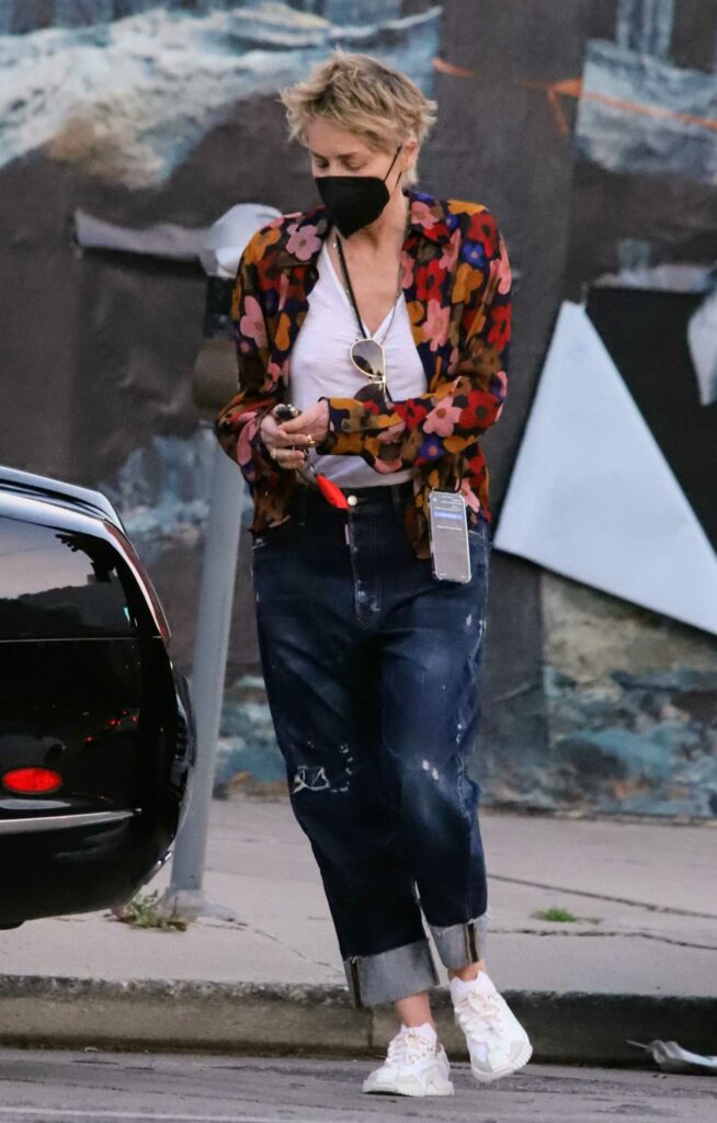Sharon Stone in a Floral Blouse