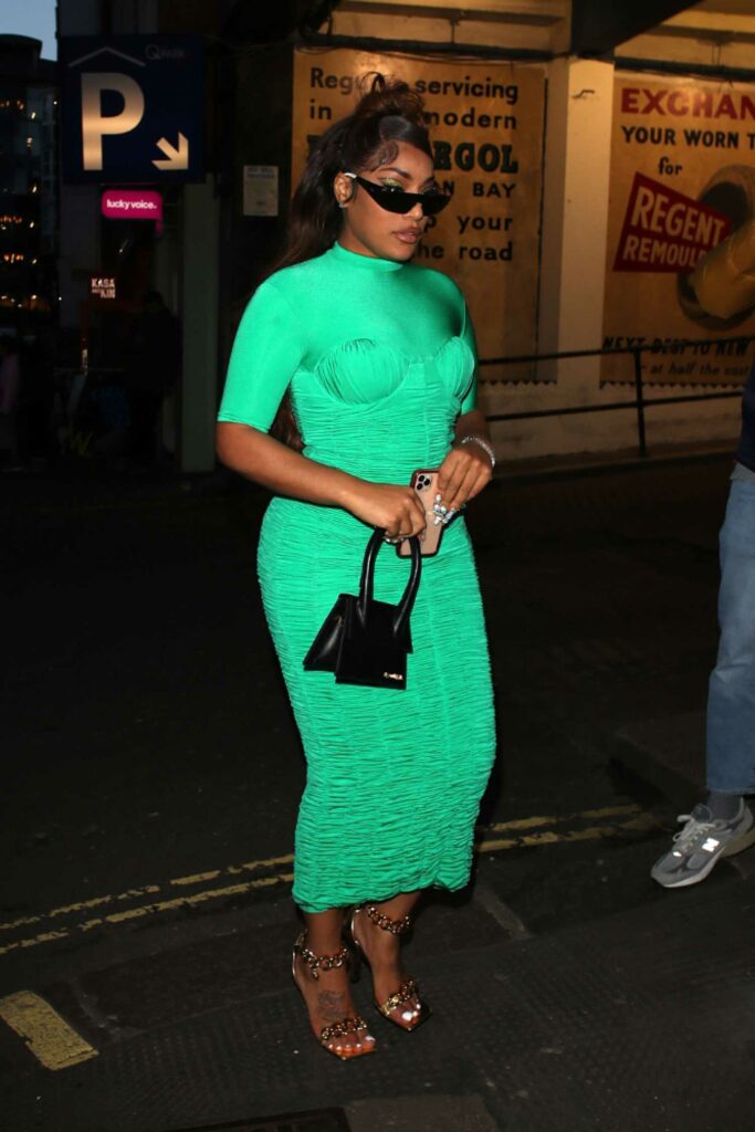 Stefflon Don in a Green Dress