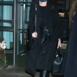 Anne Hathaway in a Black Coat Leaves Her Hotel in New York