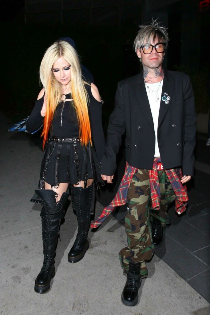 Avril Lavigne in a Black Mini Skirt