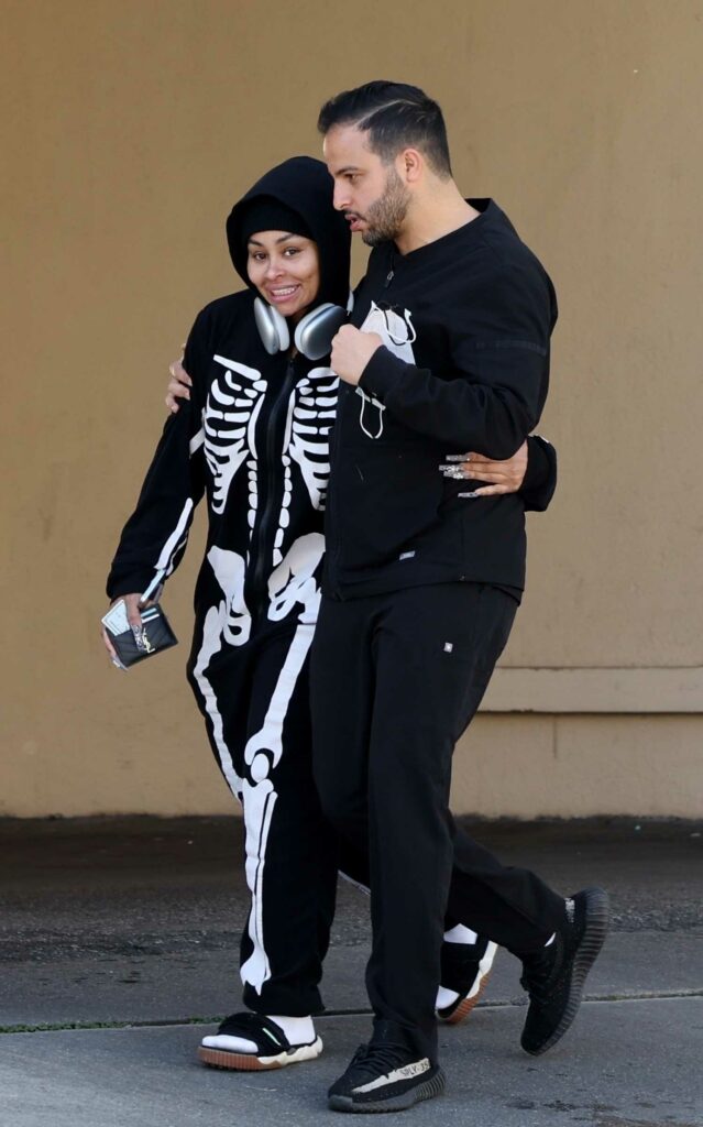 Blac Chyna in a Black Skeleton Print Catsuit