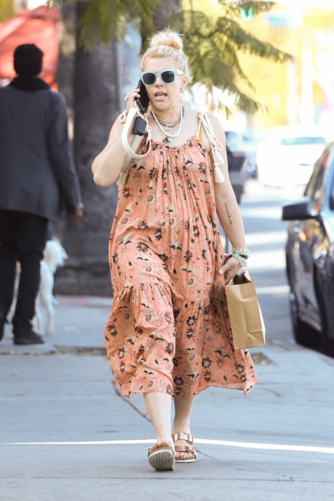 Busy Philipps in an Orange Floral Dress