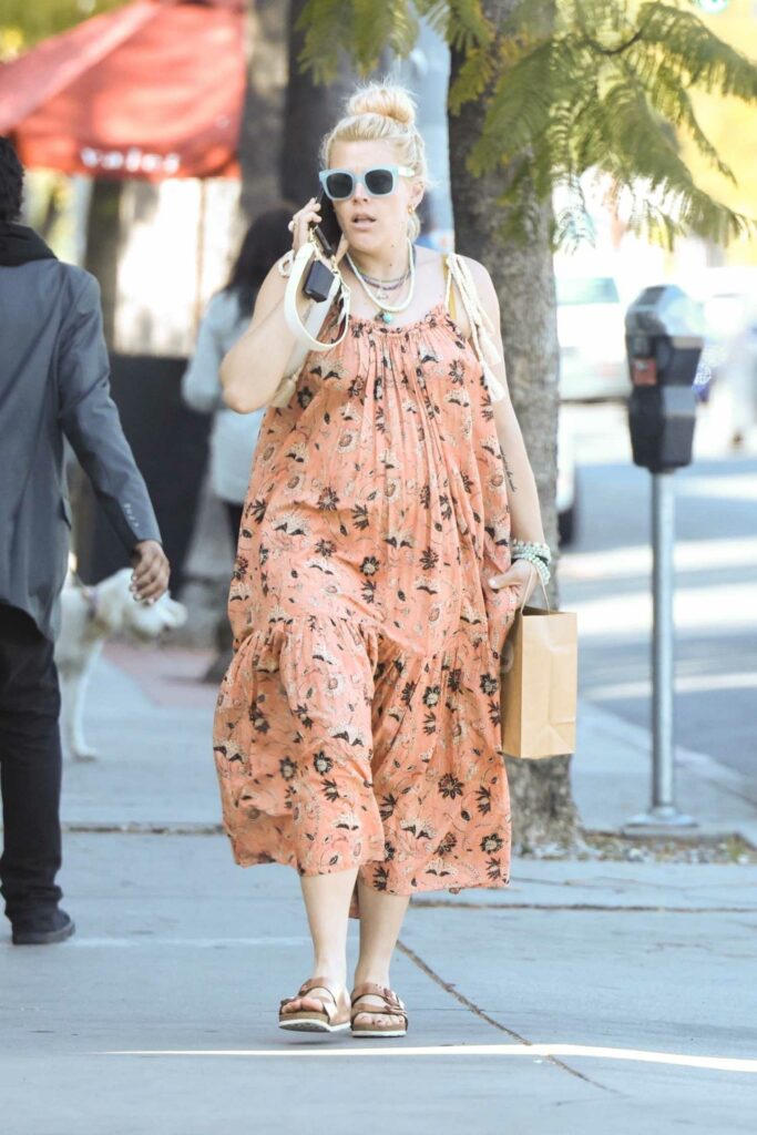 Busy Philipps in an Orange Floral Dress