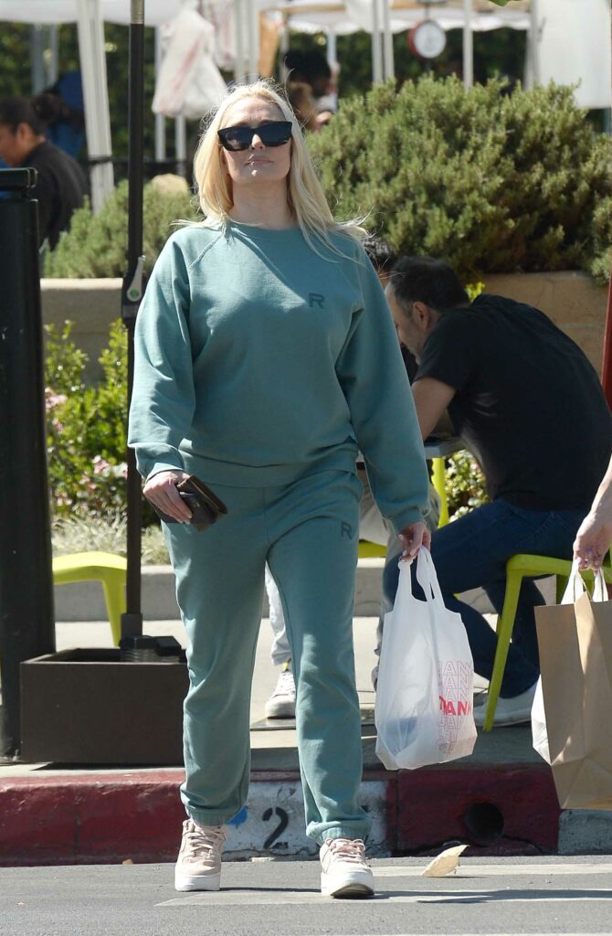 Erika Jayne in a Turquoise Sweatsuit