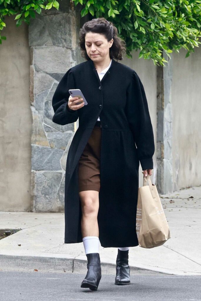 Alia Shawkat in a Black Coat