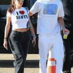 Anastasia Karanikolaou in a White Cropped Tee Arrives at 2022 Coachella Valley Music and Arts Festival in Indio