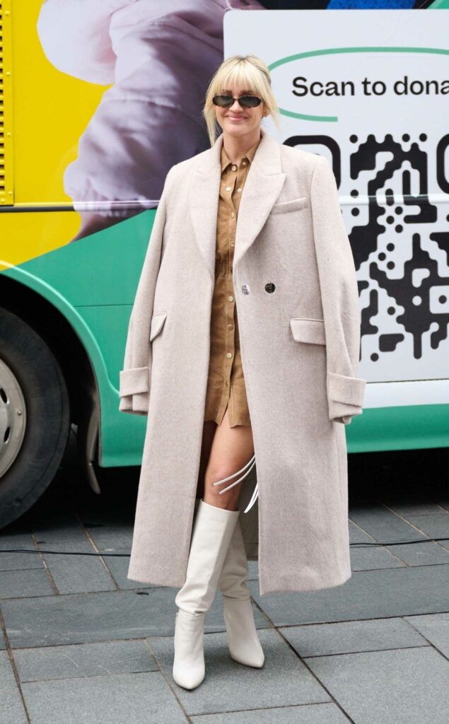 Ashley Roberts in a Beige Coat
