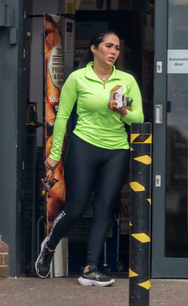 Chloe Brockett in a Neon Green Track Jacket
