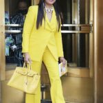 Garcelle Beauvais in a Yellow Pantsuit Leaves the CBS Studios in New York