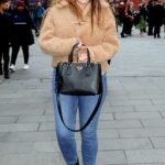 Kelly Brook in a Blue Jeans Leaves the Heart Radio Studios in London