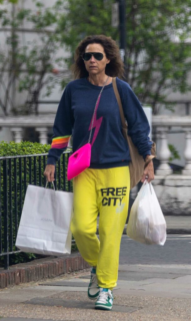 Minnie Driver in a Yellow Sweatpants