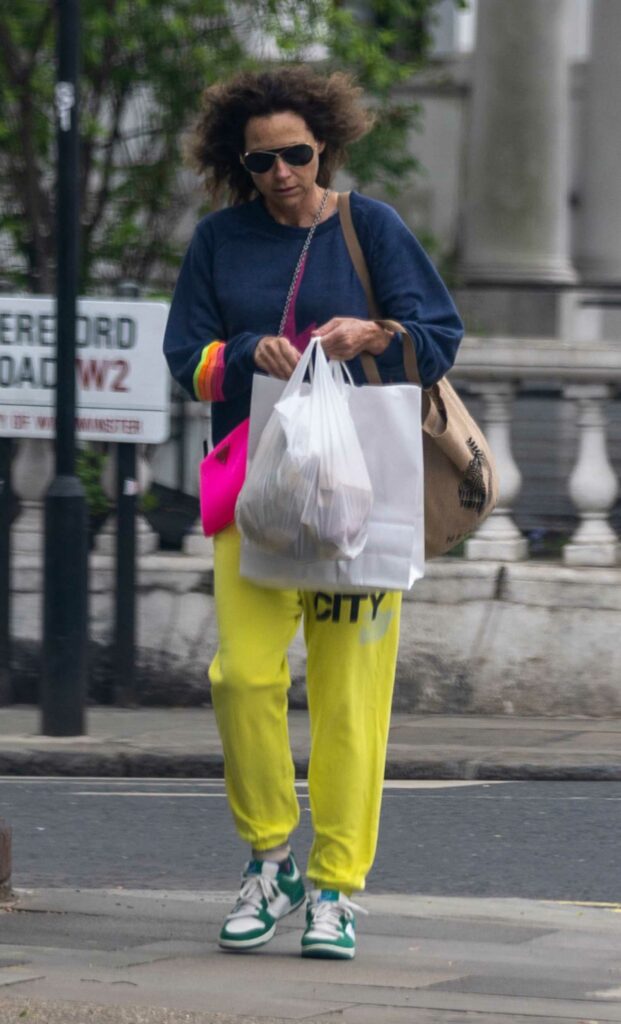 Minnie Driver in a Yellow Sweatpants