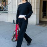 Bella Hadid in a Black Sweatsuit Leaves Her Apartment in New York