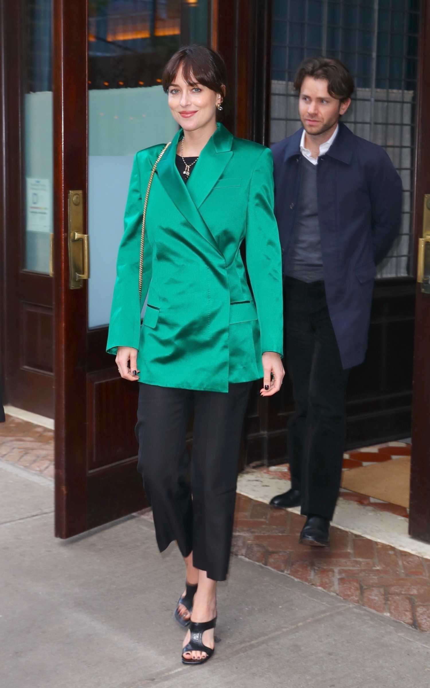 Dakota Johnson in a Green Blazer Leaves The Greenwich Hotel in New York
