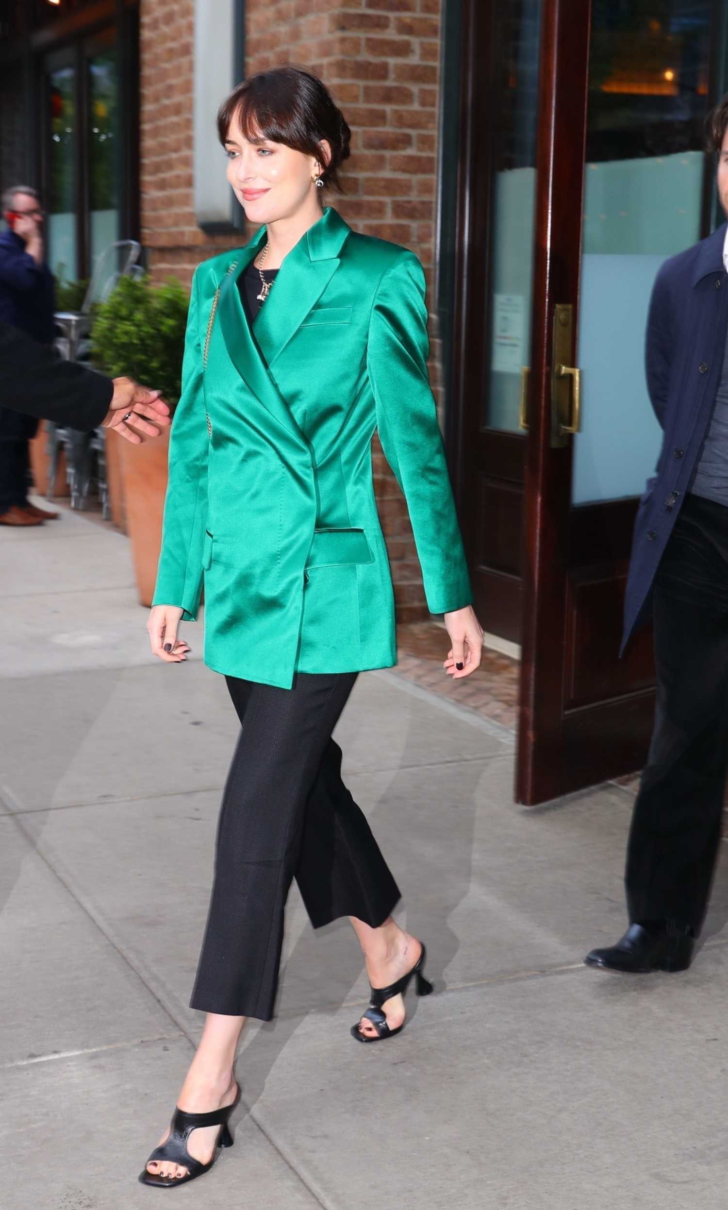 Dakota Johnson in a Green Blazer Leaves The Greenwich Hotel in New York
