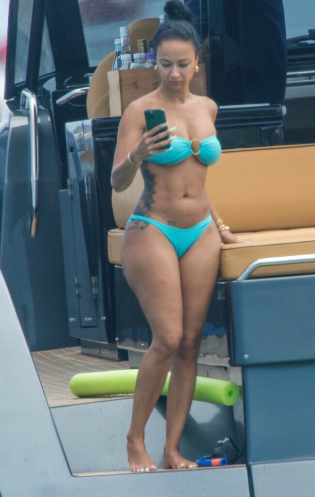 Draya Michele in a Turquoise Bikini