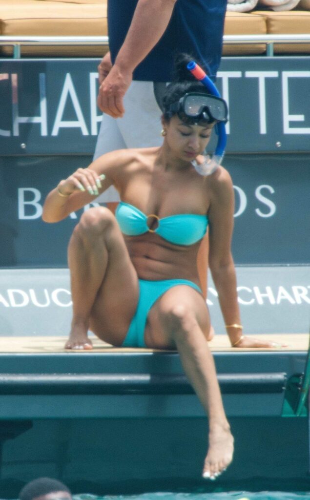Draya Michele in a Turquoise Bikini