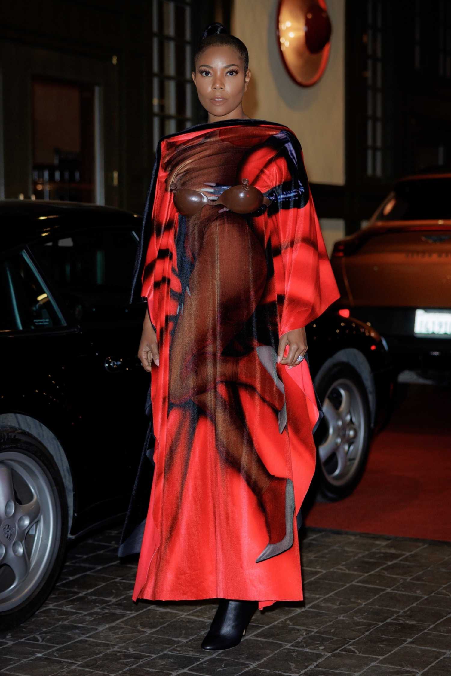 Gabrielle Union in a Red Loewe Gown Leaves Dinner at Casa Cipriani with