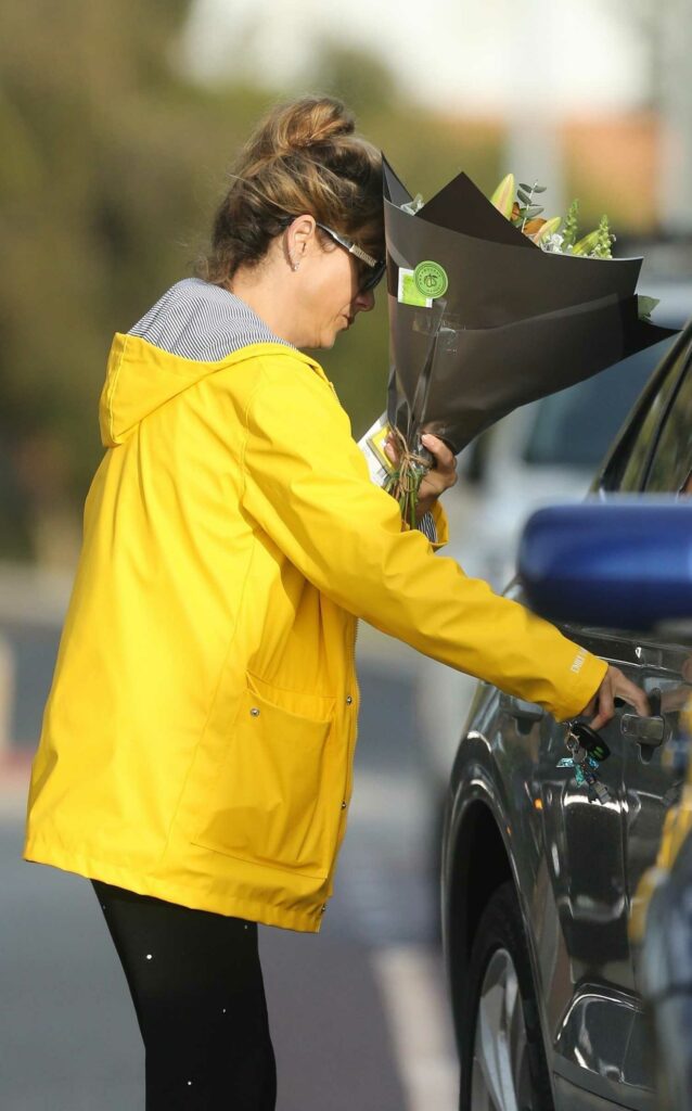 Kate Walsh in a Yellow Jacket