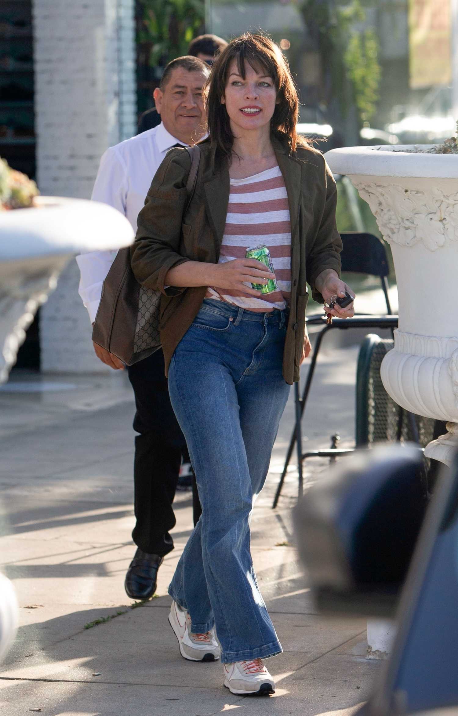 Milla Jovovich in an Olive Blazer Was Seen on Melrose Place in West