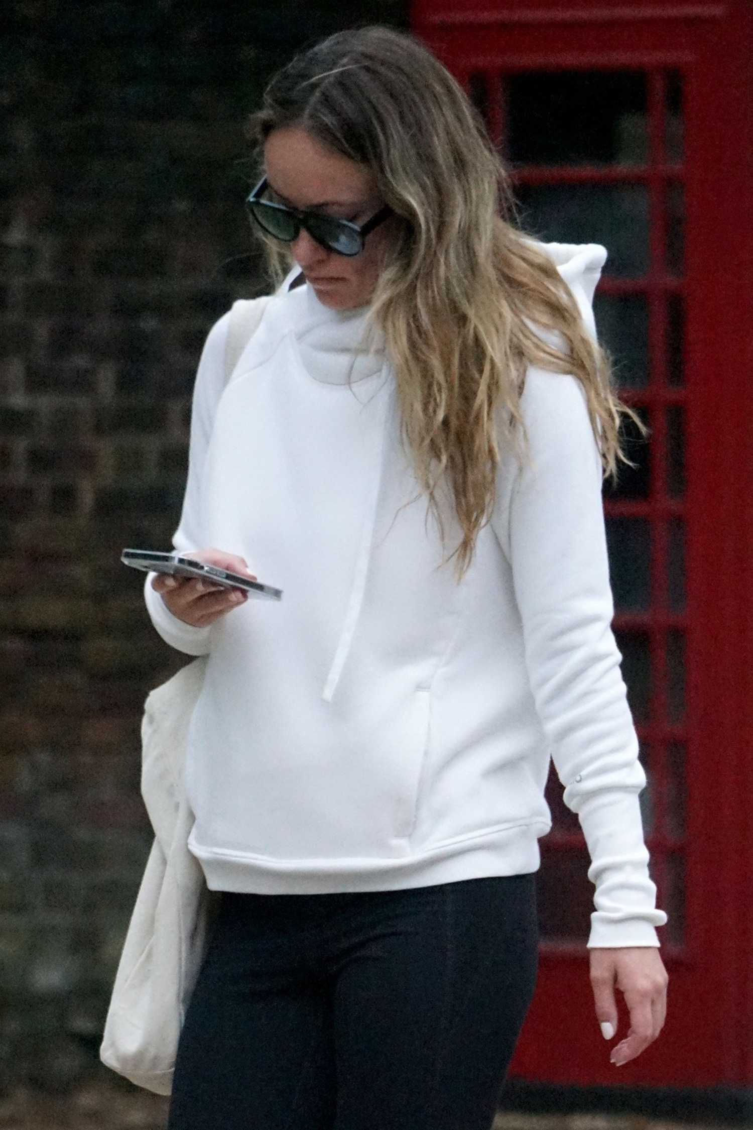 Olivia Wilde in a White Hoodie Was Seen Out in Hampstead in North