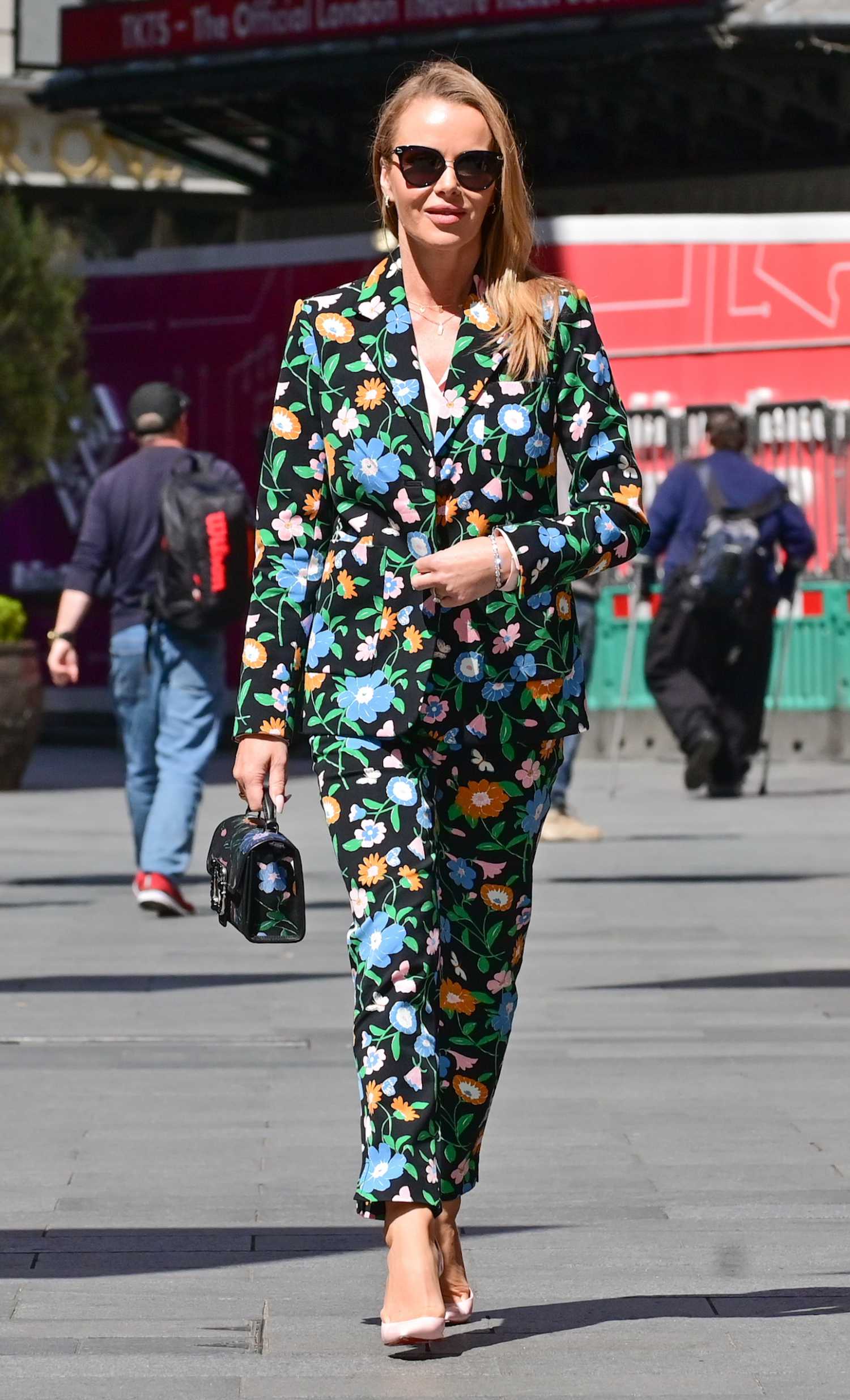Amanda Holden in a Flower Trouser Suit Leaves the Heart Radio in London