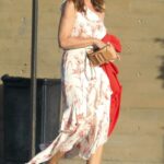 Cindy Crawford in a White Patterned Dress Arrives at Nobu Restaurant Out with Rande Gerber in Malibu