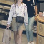 Emma Watson in an Olive Shorts Was Seen Out with a Friend Nupur Sharma on Holiday in Barcelona