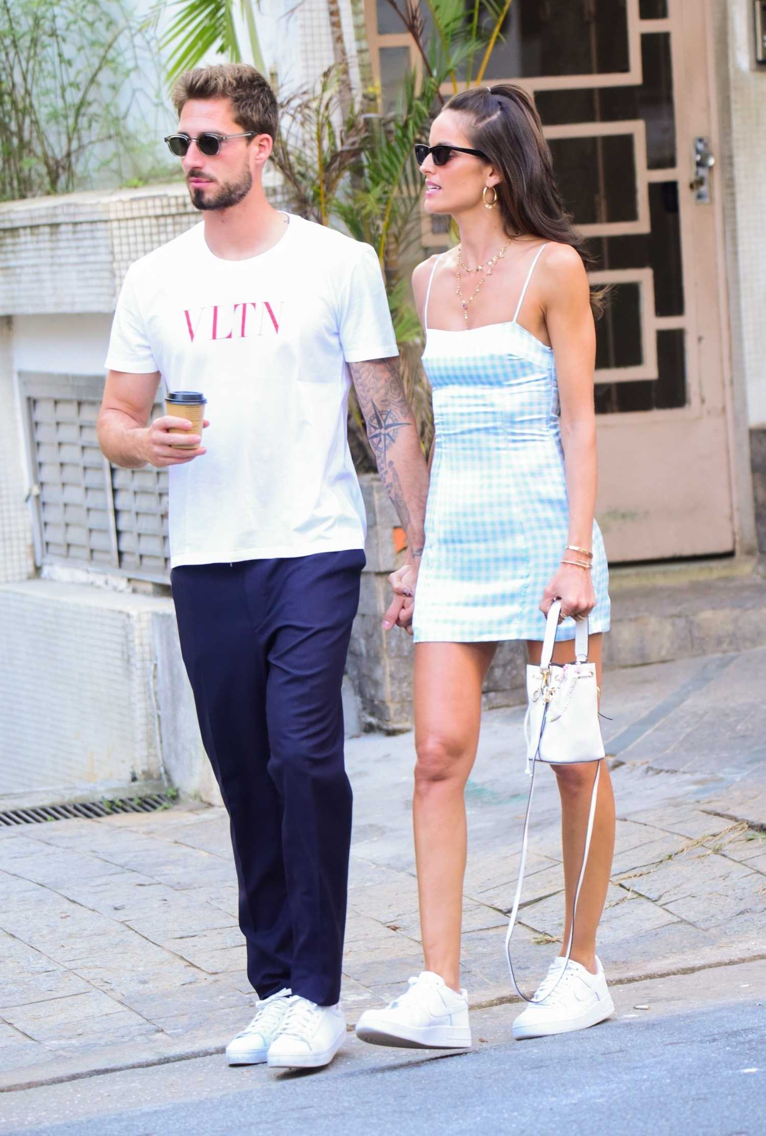 Izabel Goulart in a White Sneakers Was Seen Out with Her Fiance Kevin ...