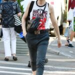 Julianna Margulies in a The Rolling Stones Tank Top Goes Shopping Around Manhattan’s Soho Area in NYC