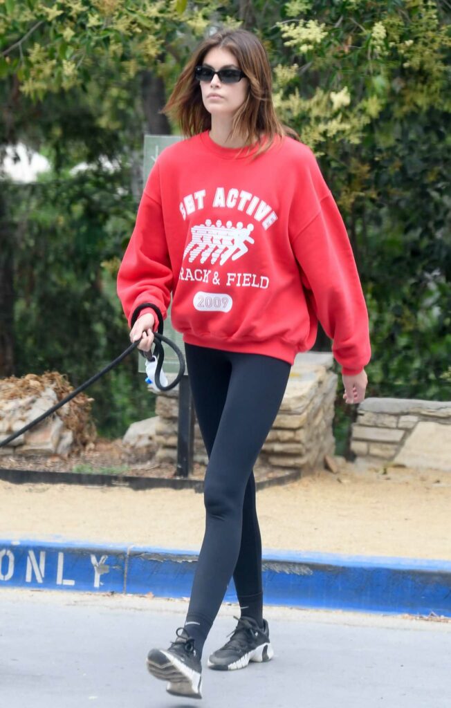 Kaia Gerber in a Red Sweatshirt