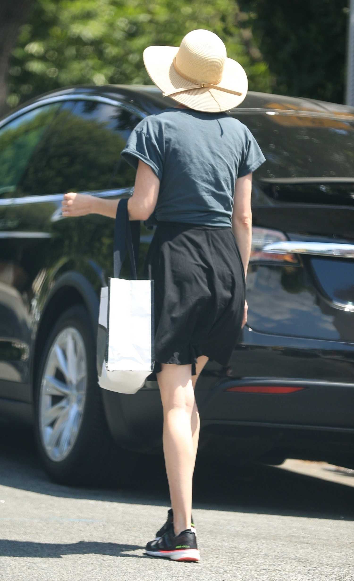 Krysten Ritter in a Black Skirt Goes Shopping on Melrose Ave. in West