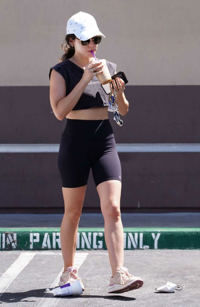 Lucy Hale in a White Cap