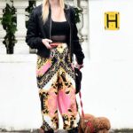 Roxy Horner in a Black Cap Walks Her Dog in Notting Hill in London