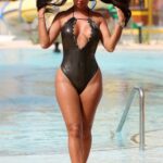 Yazmin Oukhellou in a Black Swimsuit By the Pool in Punta Cana, Dominican Republic