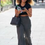 Amber Gill in a Grey Pants Arrives at the Global Radio Studios in London