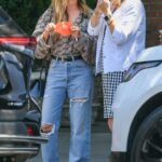 Ashley Tisdale in a Blue Ripped Jeans Was Seen Out with Her Mom in New York