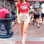 Blanca Blanco in a Red Tee Attends the Washington Nationals vs Seattle Mariners Game in Washington