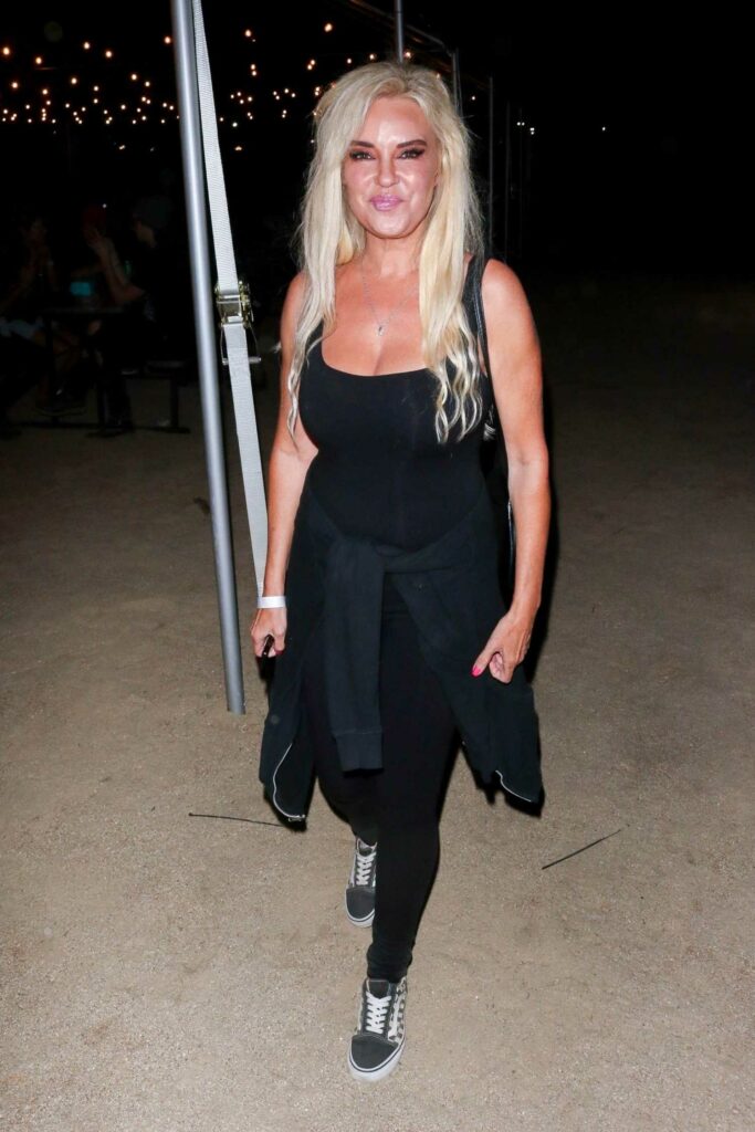 Bridget Marquardt in a Black Ensemble