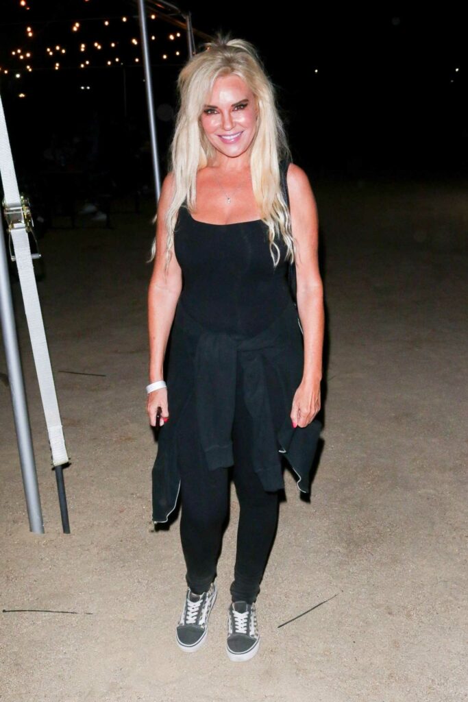 Bridget Marquardt in a Black Ensemble