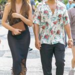 Chrissy Teigen in a Black Dress Goes Shopping Out with John Legend in Nice