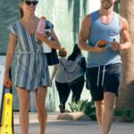 Hayley Erbert in a Striped Mini Dress Was Seen Out with Derek Hough on a Hot Day in Studio City
